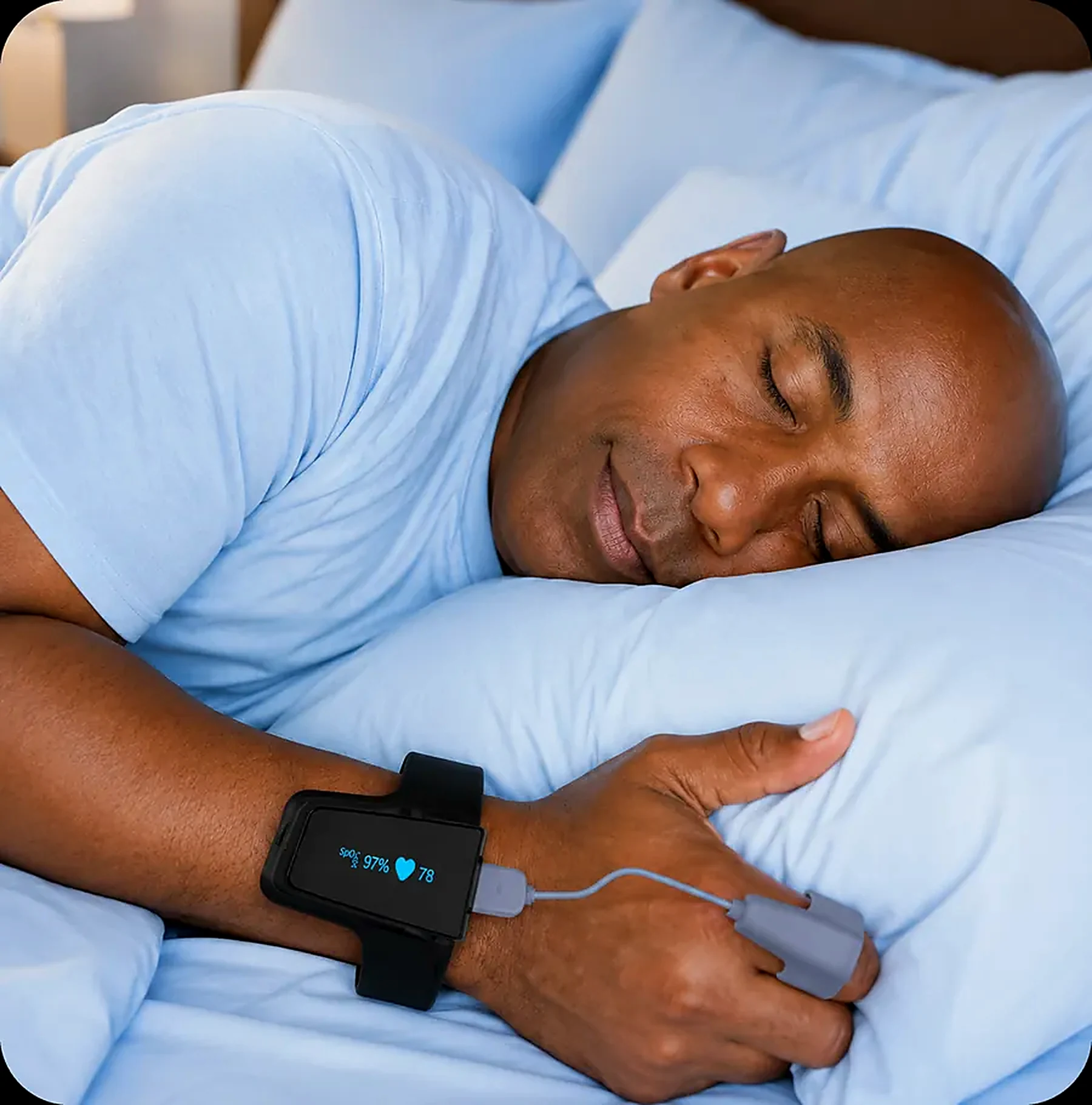 A man asleep wearing VitalWeave Sleep